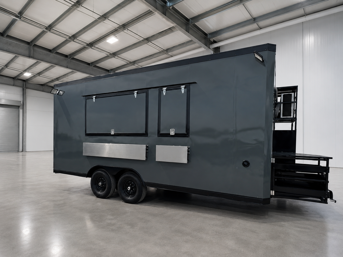 Dark gray food trailer in warehouse