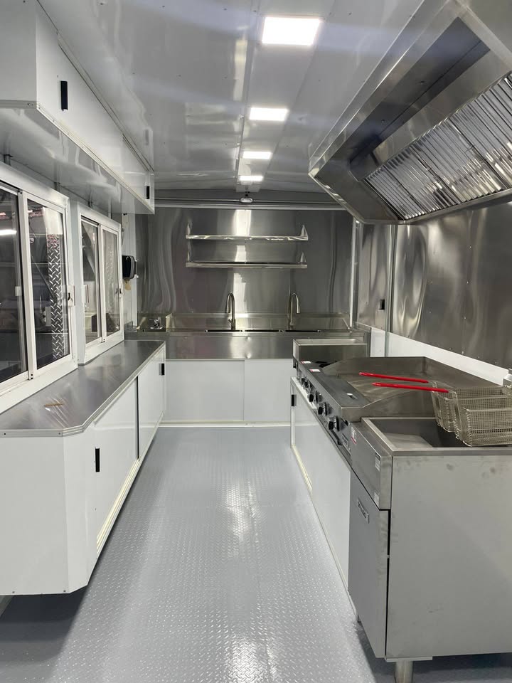 White interior kitchen with griddle and fryer